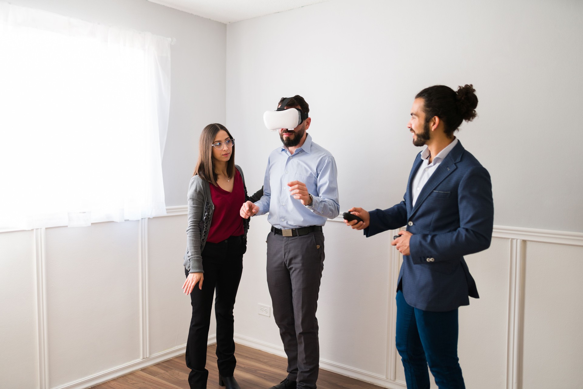 Real estate agent with two clients